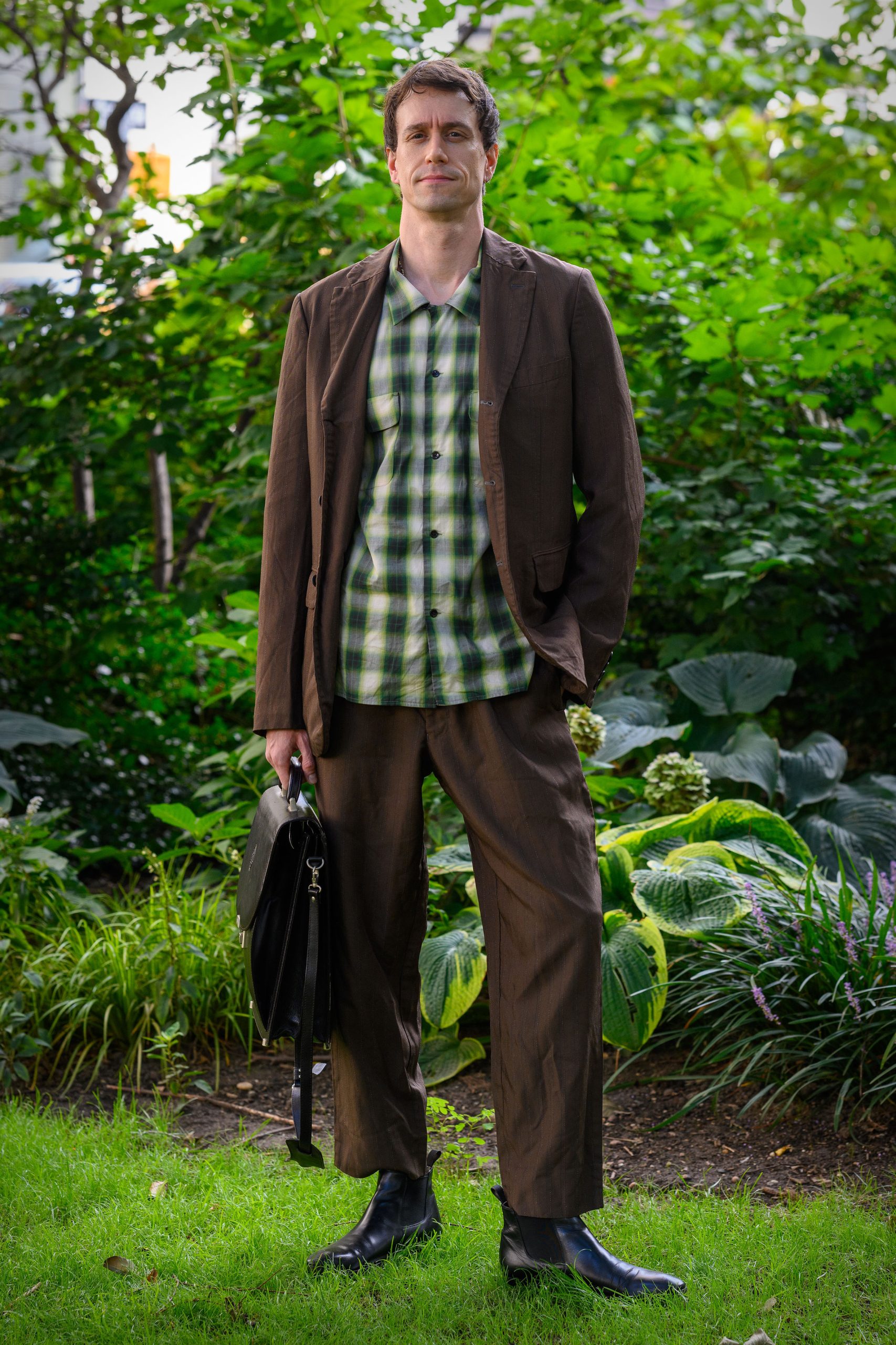 Alexander Beznes standing in Madison Square Park across the street from his Flatiron office.